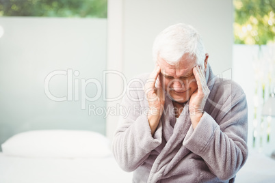 Senior man with headache