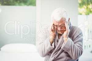 Senior man with headache