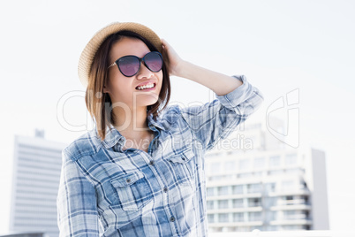 Young woman looking away and smiling