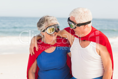 Senior couple wearing superman costume