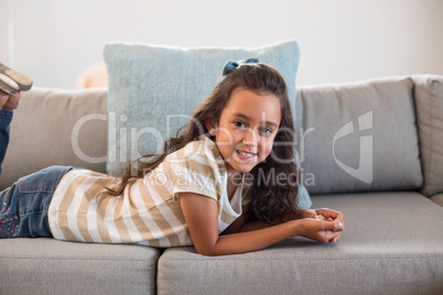 Portrait of a girl lying on sofa