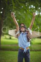 Young girl pretending to fly