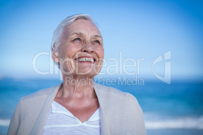 Senior woman smiling and looking away