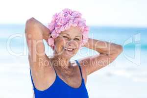 Pretty mature woman posing on the beach
