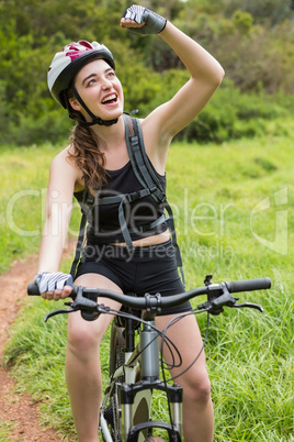 Smiling woman cycling