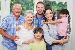 Portrait of cheerful multi generation family