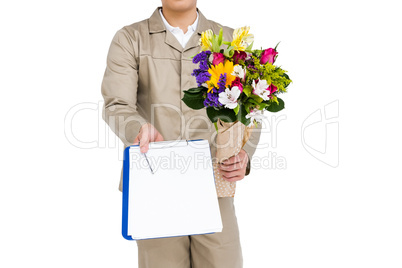 Delivery man with a bouquet and clipboard