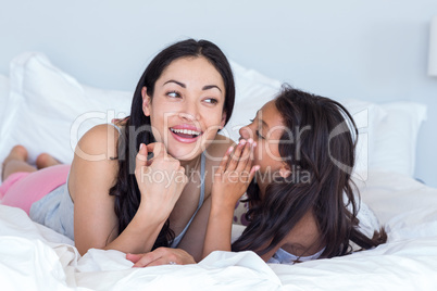 Woman relaxing with her daughter