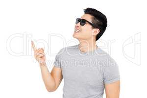 Young man posing in sunglasses