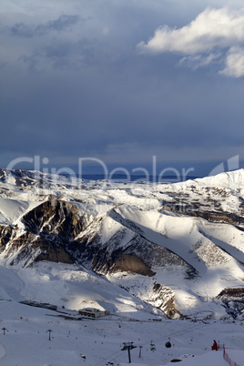 Top view of the ski resort at sun evening