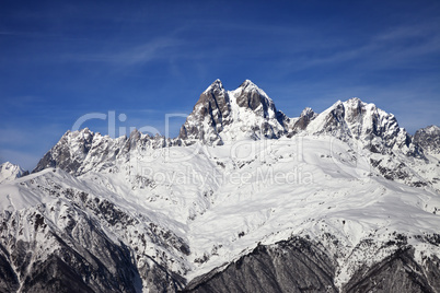 Mount Ushba in winter at sunny day