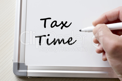 Tax time written on whiteboard