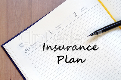 Insurance plan write on notebook