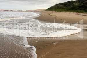 Foamy Wave on Beach