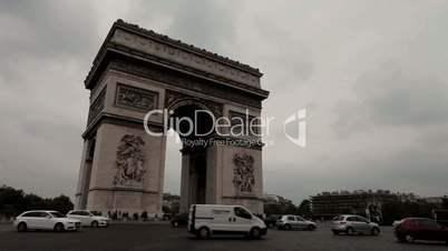 Arc De Triomphe on a cloudy day. Long shot, slight angle.