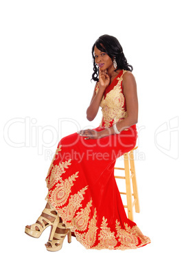 African American woman in dress.