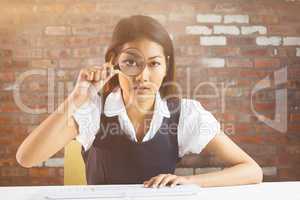 Young thoughtful businessman standing in office