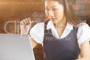 Young thoughtful businessman standing in office