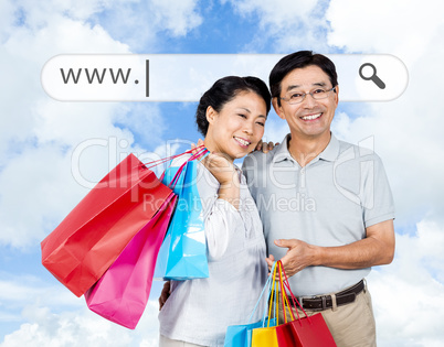 Caucasian woman holding shopping bags outdoor