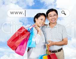 Caucasian woman holding shopping bags outdoor