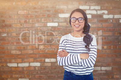 Young thoughtful businessman standing in office