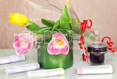 Cosmetics for body and hair and flowers.