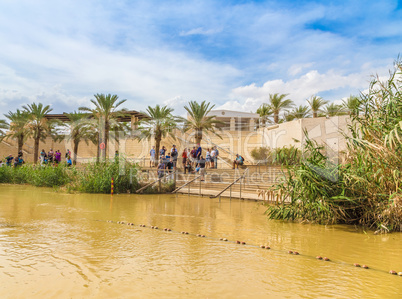 Tourists near Jordan River, at the site of Jesus' baptism
