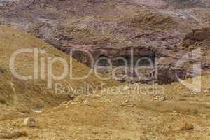 Ancient cave settlement Bedouins in desert, Jordan