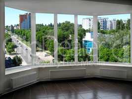 modern window to the boisterous street of city