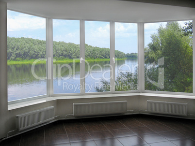 modern window of veranda overlooking the river