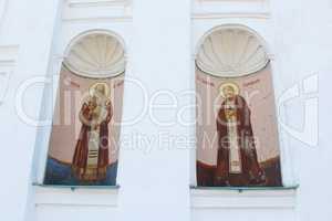 images of two Saints on the Triytskyi temple wall