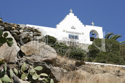 Traditional church in Greece with a bell. panorama