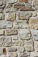 Wall of large rough granite boulders