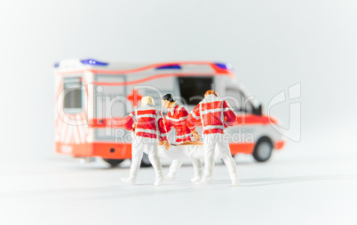 paramedics transport a patient to german ambulance car