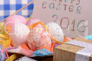 hand made eggs at a gift box, happy easter invitation card