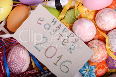 Easter background with eggs, ribbons and spring decoration