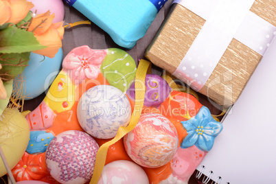 Easter background with eggs, ribbons and spring decoration