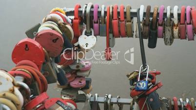 Closed colorful wedding clasps on the pipes