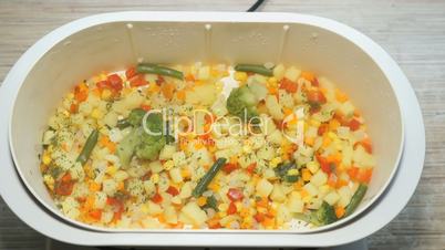 Various vegetables are cooked in the double boiler