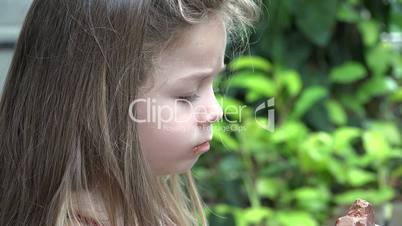 Toddlers Eating Chocolate Snack