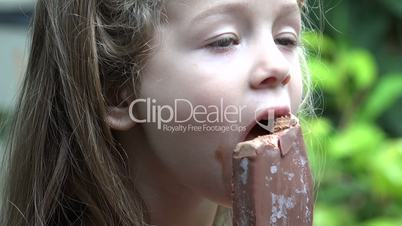 Toddler Girl Eating Popsicle