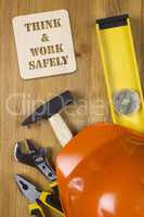 Construction concept with hard hat working tools