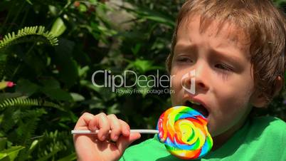 Sad Toddler Boy With Lollipop