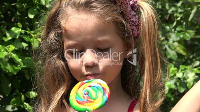 Toddler Girl With Lollipop