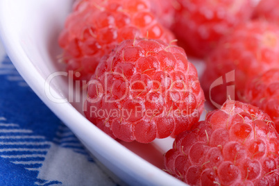 Fresh sweet raspberries close up