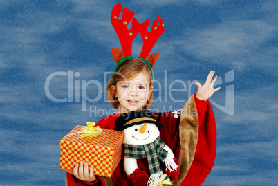 happy little girl holding Christmas gift