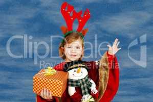 happy little girl holding Christmas gift