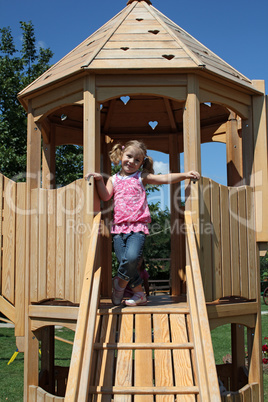 happy little girl on playground