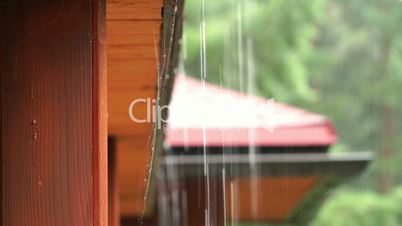 Look at the rain drops from the roof of the cottage