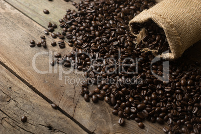 Fresh coffee beans on wood